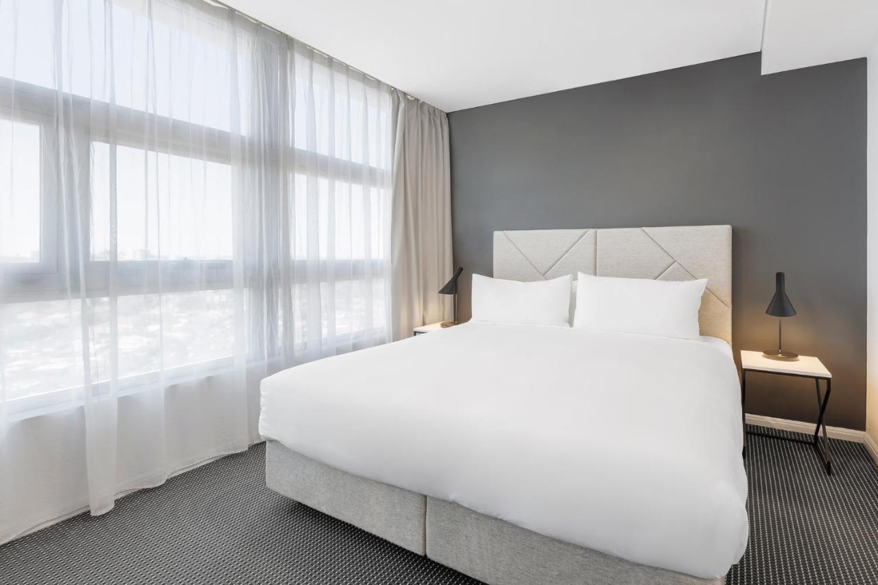 Meriton Suites Zetland Sidney Exterior foto A bedroom at the hotel