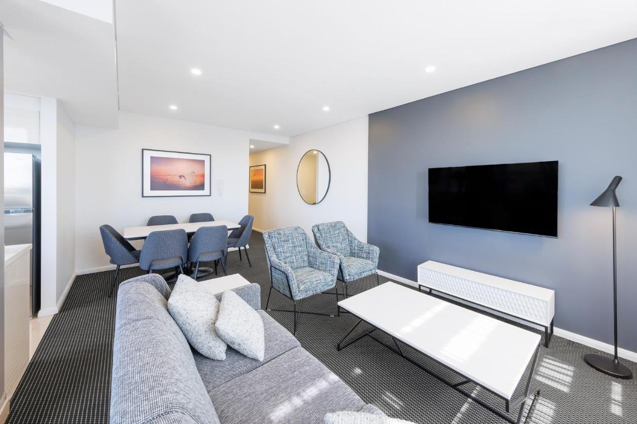 Meriton Suites Zetland Sidney Exterior foto A living room at the hotel