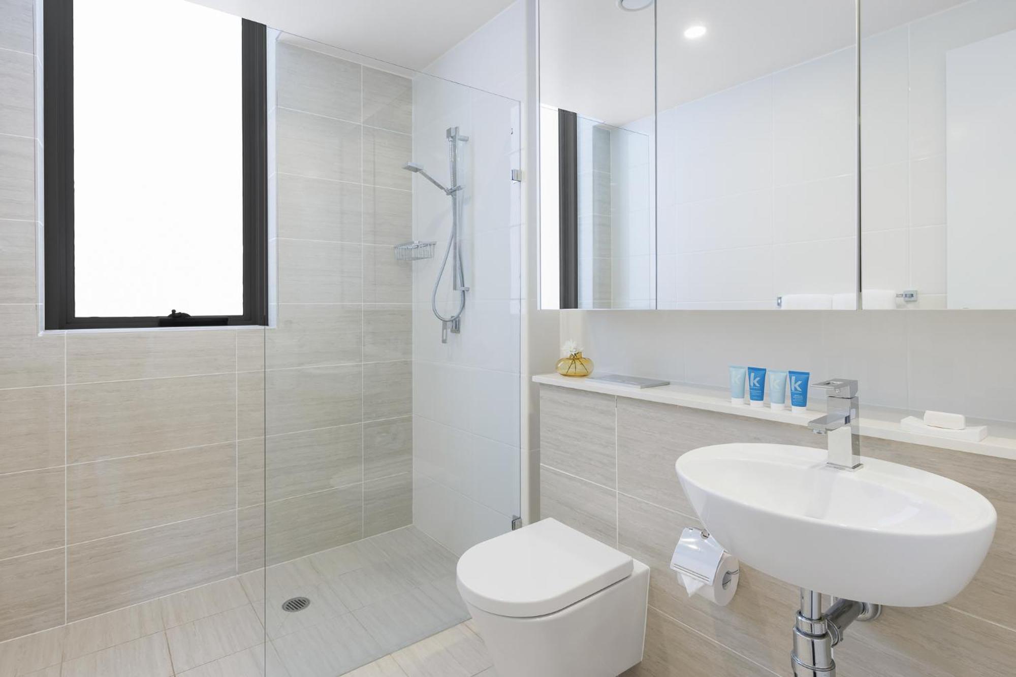 Meriton Suites Zetland Sidney Quarto foto A modern bathroom